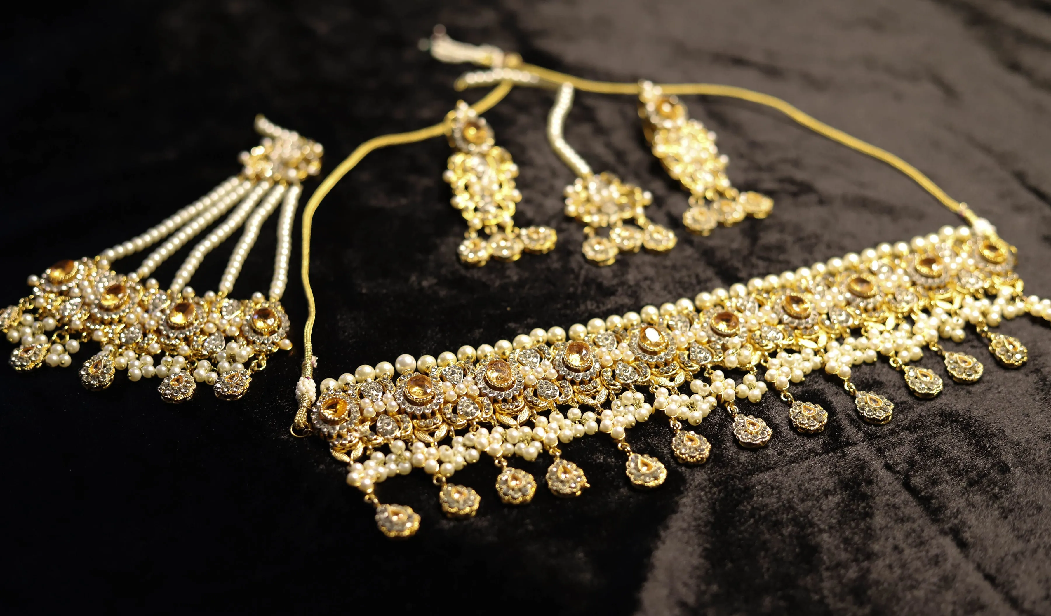 Champagne color kundan choker set with jhoomar and tikka